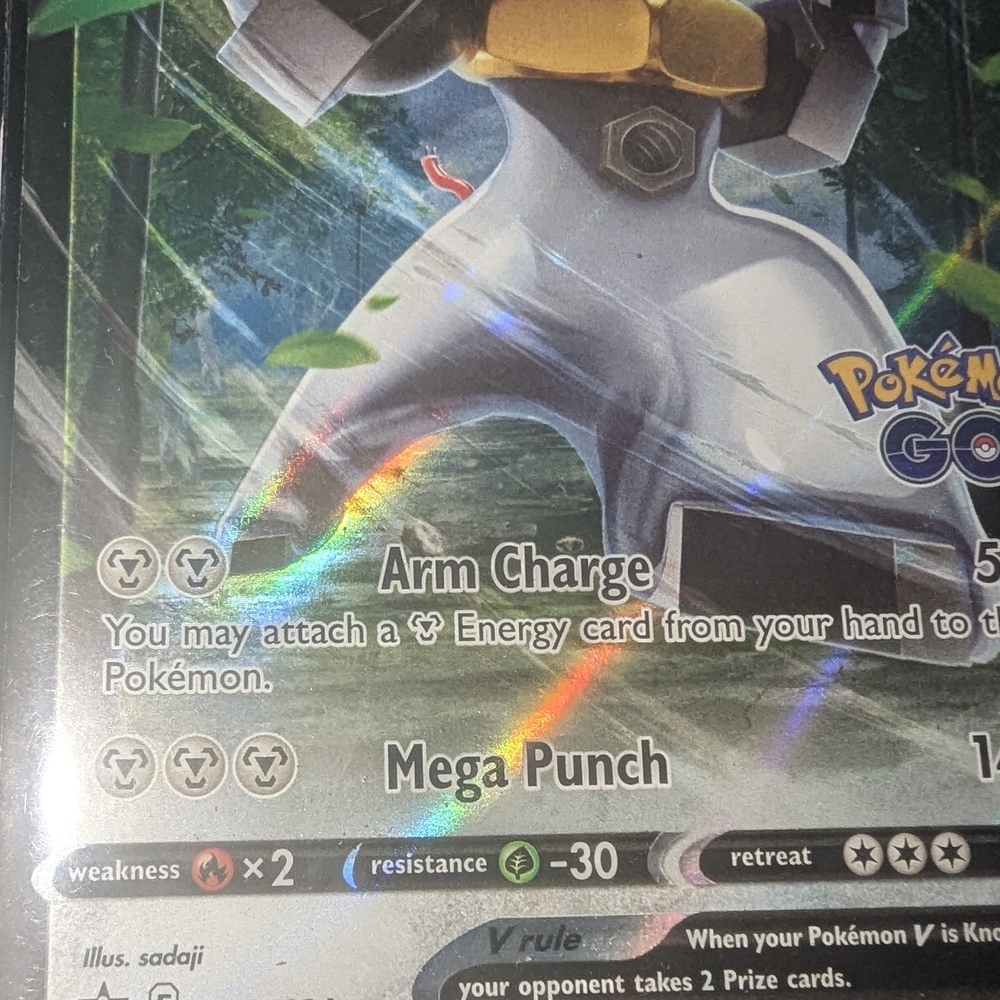 Pokemon Silver Holo Card with Yellow Accents